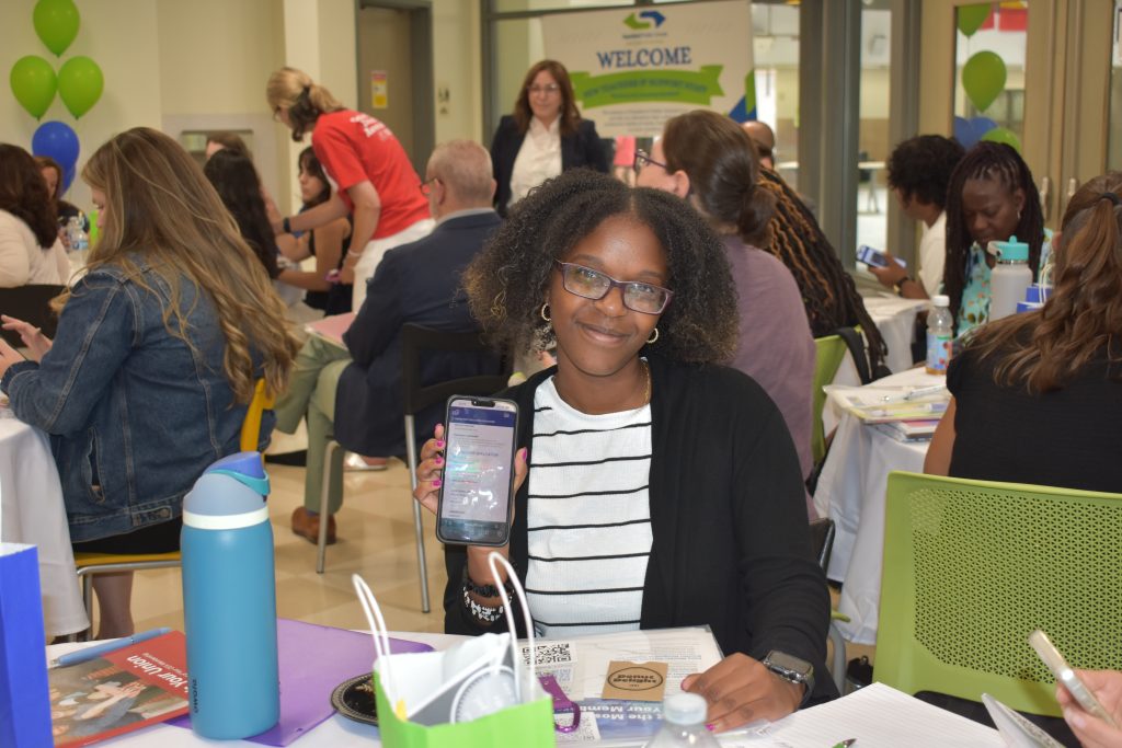 One of Stamford's newest educators shows off her new CEA membership!